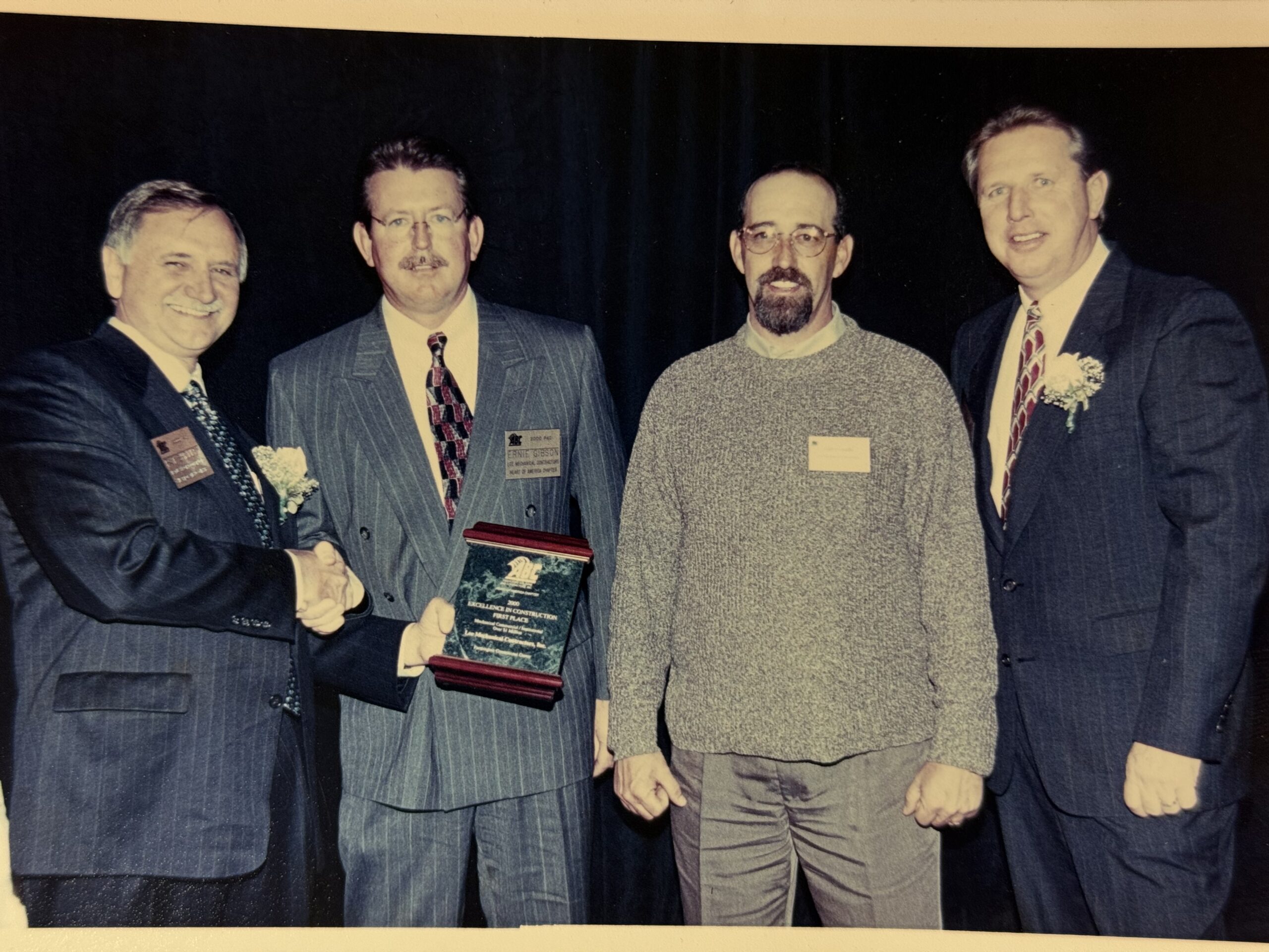 Ernie Gibson and Gale Grounds accepts ABC Excellence in Construction Award in 2000